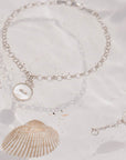 bracciale catenina argento piccolo ciondolo bottoncino madreperla bianca made in italy